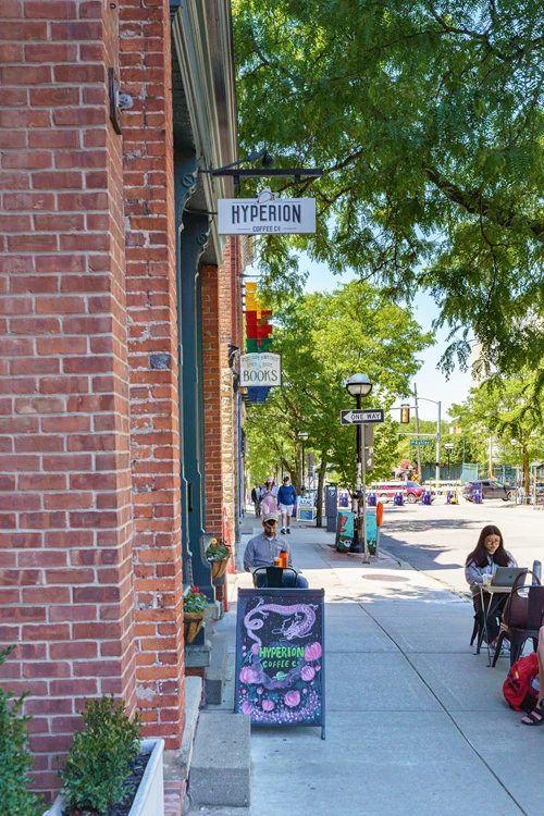 neighborhood shot of coffe shop for residiential real estate photography services for airbnb/vrbo property in Ann Arbor